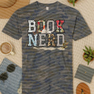 Black Book Nerd graphic tee by Anchored Grace Boutique featuring a book-themed design on the front.