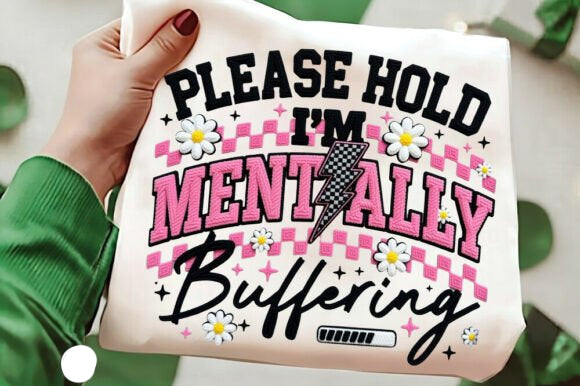 Black graphic tee featuring the text "Please Hold I'm Mentally Buffering" from Anchored Grace Boutique, casual unisex t-shirt.