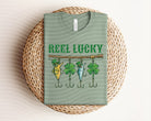 Lucky graphic tee by Anchored Grace Boutique featuring a colorful reel design on soft cotton fabric.