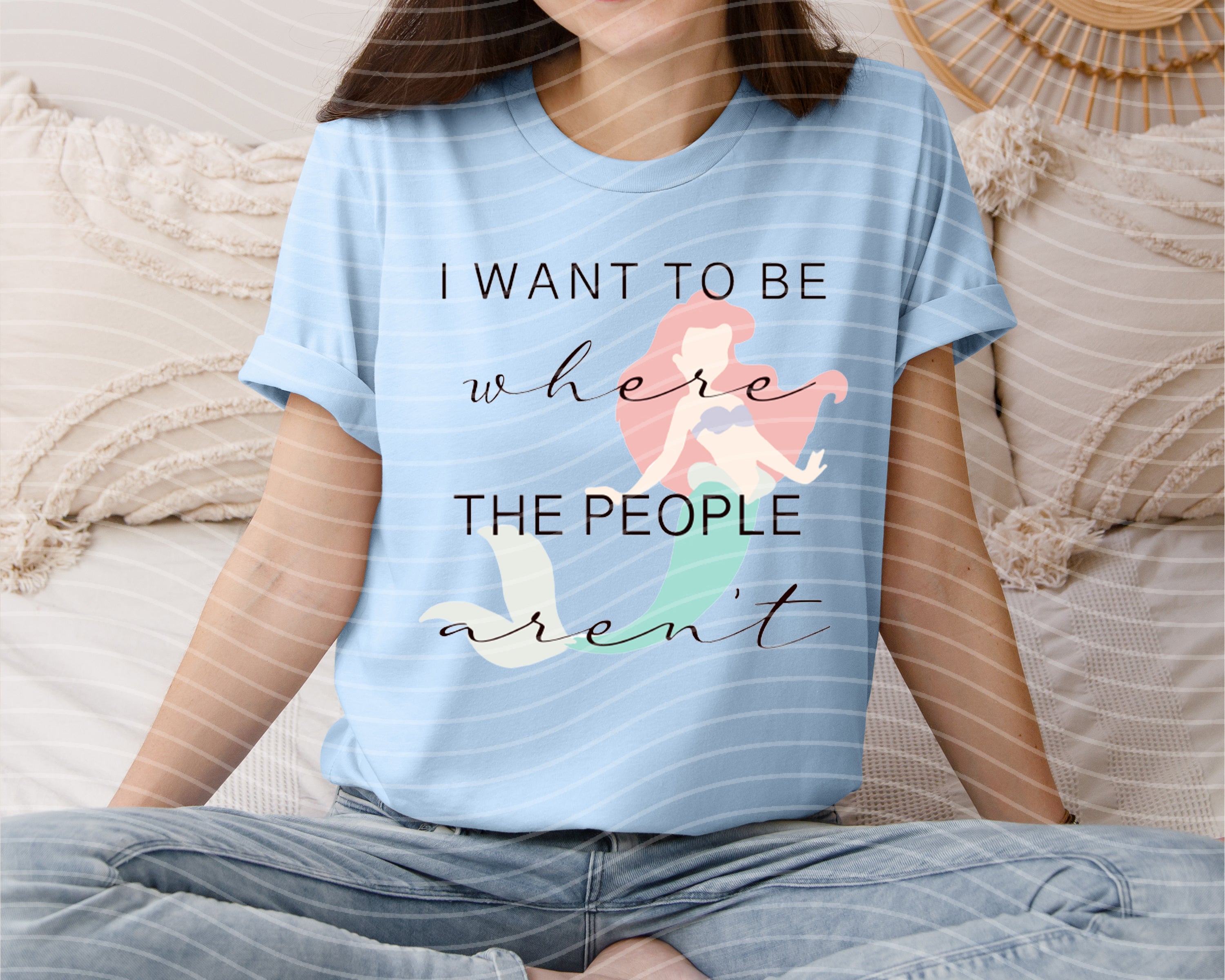 Light gray graphic tee from Anchored Grace Boutique featuring a design inspired by "I Want to Be Where the People Aren't."