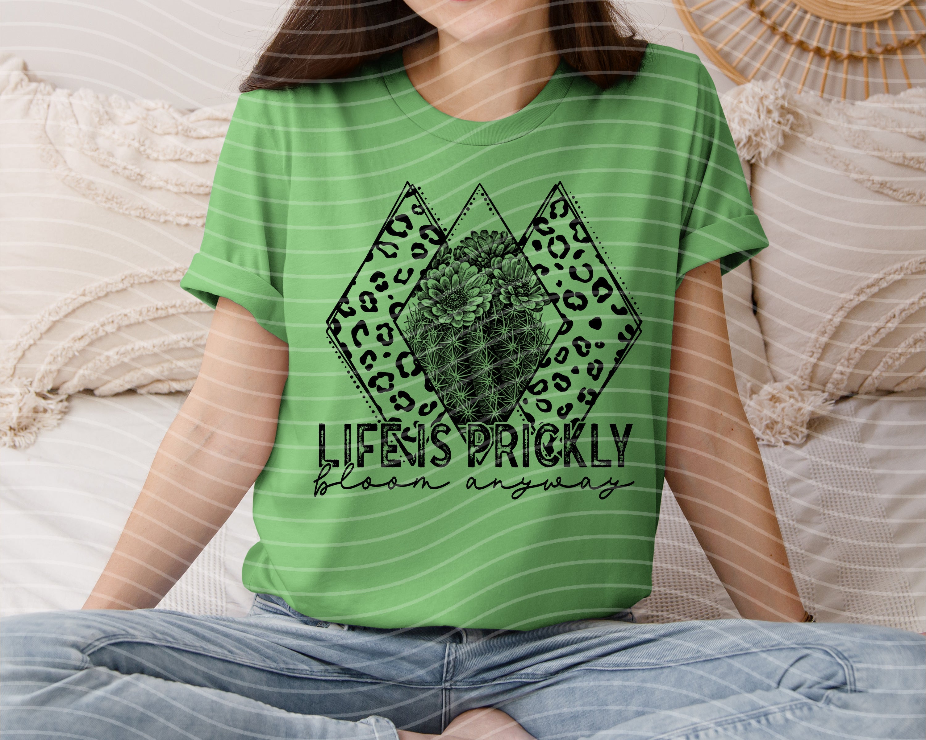 Life is Prickly Bloom Anyway graphic tee from Anchored Grace Boutique, featuring a colorful floral and cactus design on soft fabric.