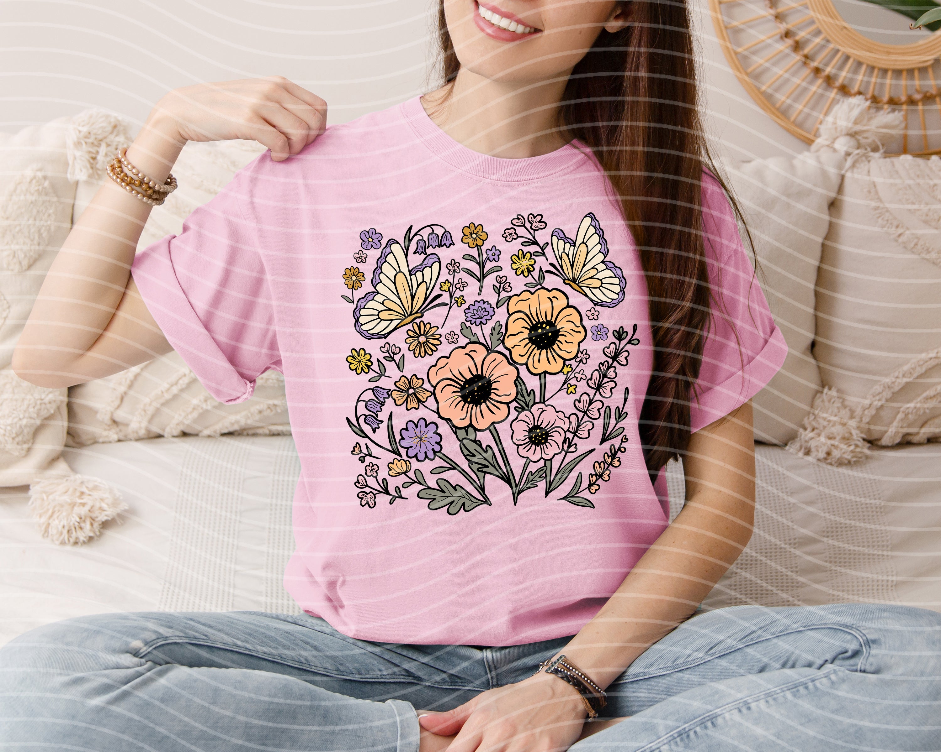 Spring floral graphic tee from Anchored Grace Boutique featuring colorful floral designs on a casual cotton shirt.