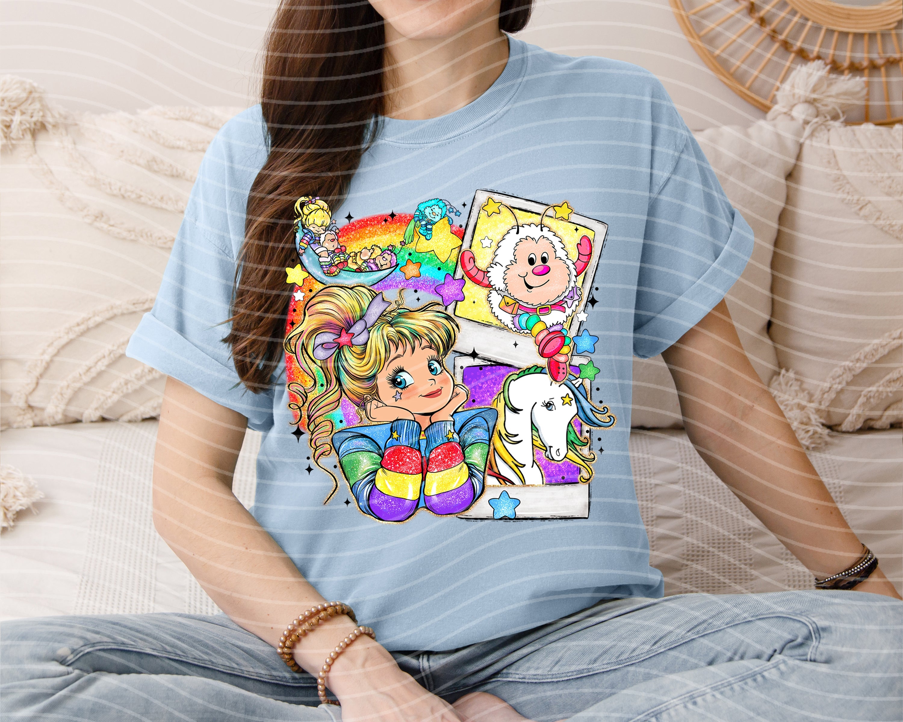 Colorful rainbow graphic tee from Anchored Grace Boutique, featuring vibrant rainbow print on casual cotton t-shirt.