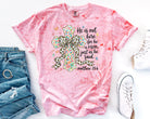 Black "He is Not Here" graphic tee by Anchored Grace Boutique, casual T-shirt with bold text design.