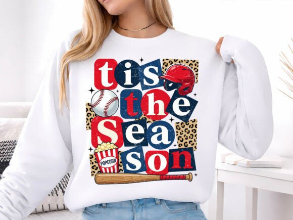 Black Tis the Season graphic tee by Anchored Grace Boutique featuring festive holiday design and bold lettering.