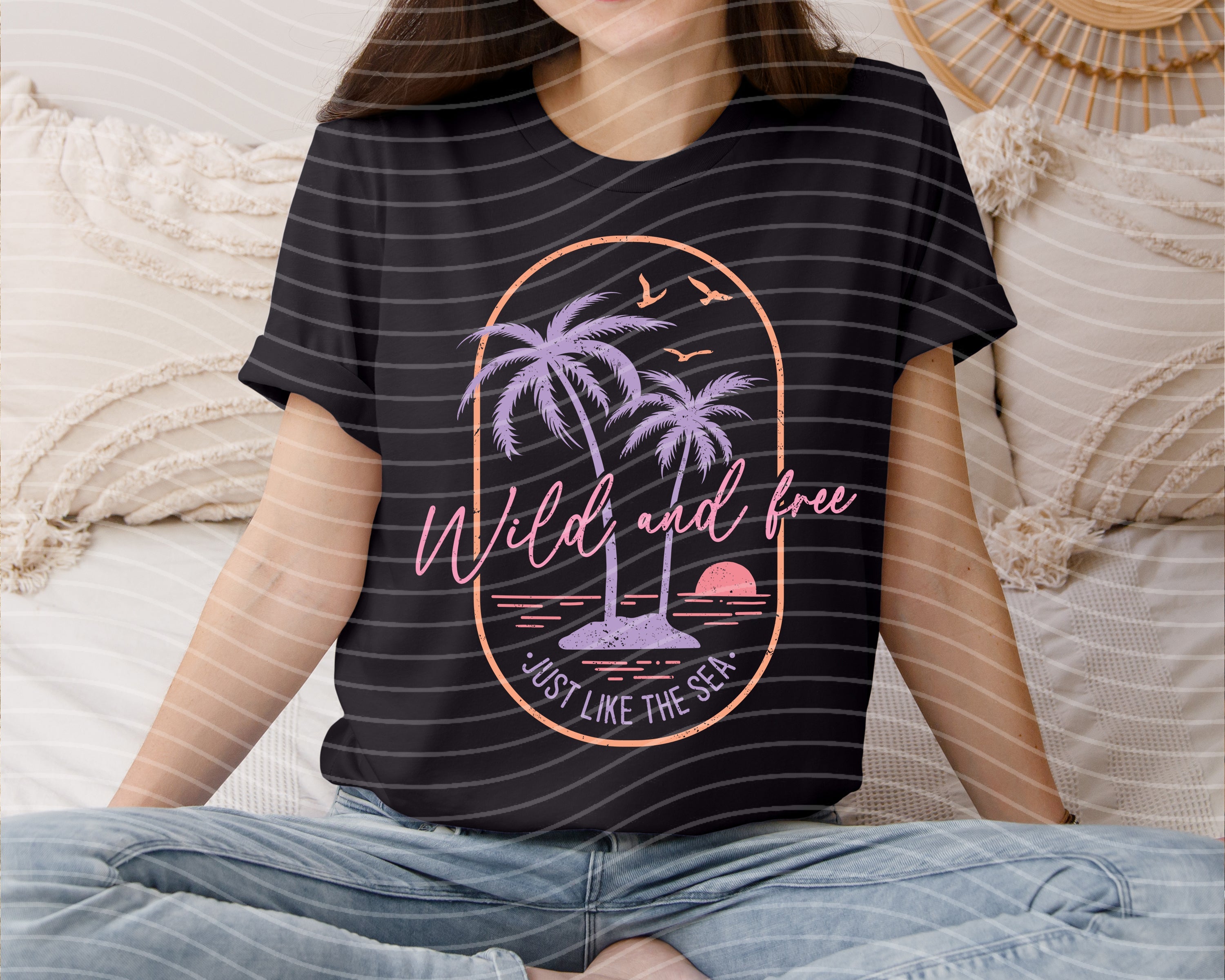 Wild and Free Just Like the Sea graphic tee by Anchored Grace Boutique, featuring ocean-inspired design on a casual t-shirt.