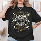 Anchored Grace Boutique graphic tee featuring a vibrant lightning strikes design on soft cotton fabric.