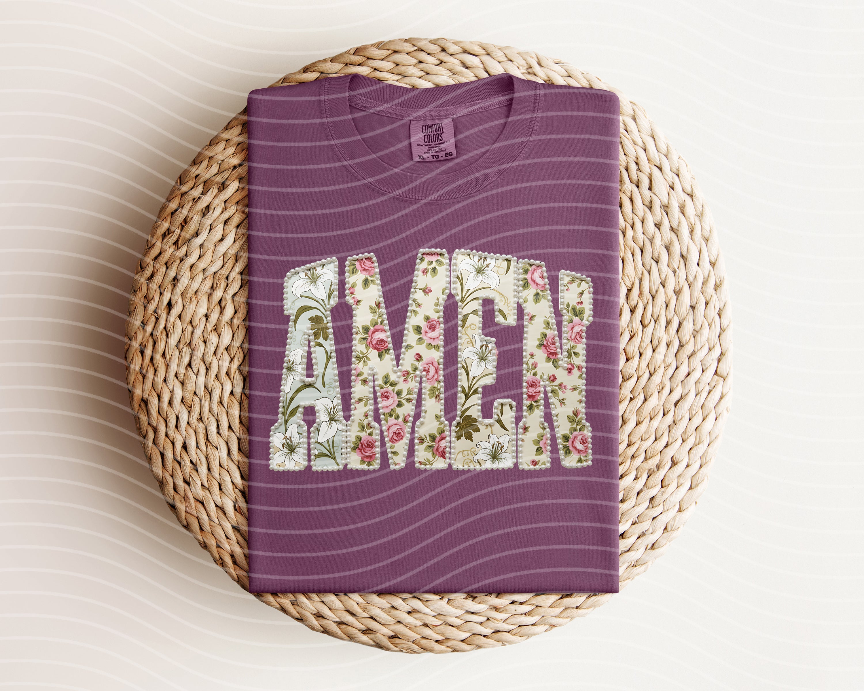 Amen floral graphic tee from Anchored Grace Boutique featuring a vibrant floral design on a casual cotton T-shirt.