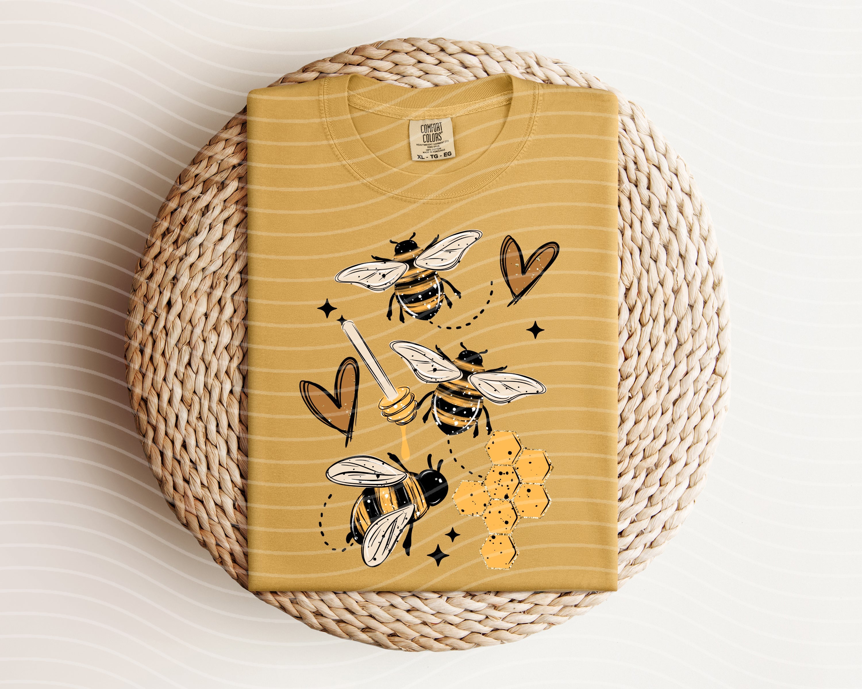 Sweet Bees graphic tee by Anchored Grace Boutique featuring a colorful bee design on soft cotton fabric.