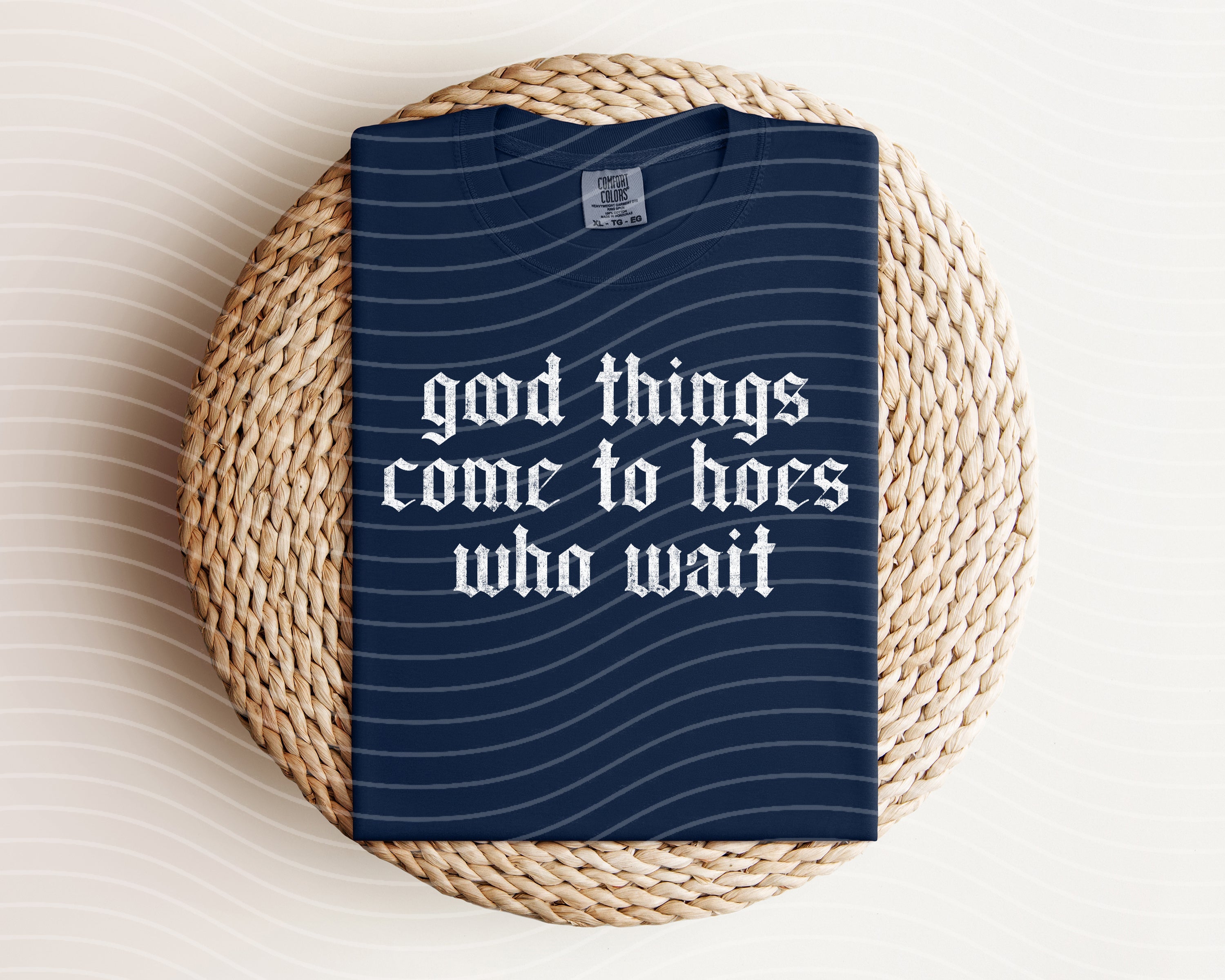 Black graphic tee from Anchored Grace Boutique featuring the phrase "Good Things Come to Hoes Who Wait" in bold lettering.