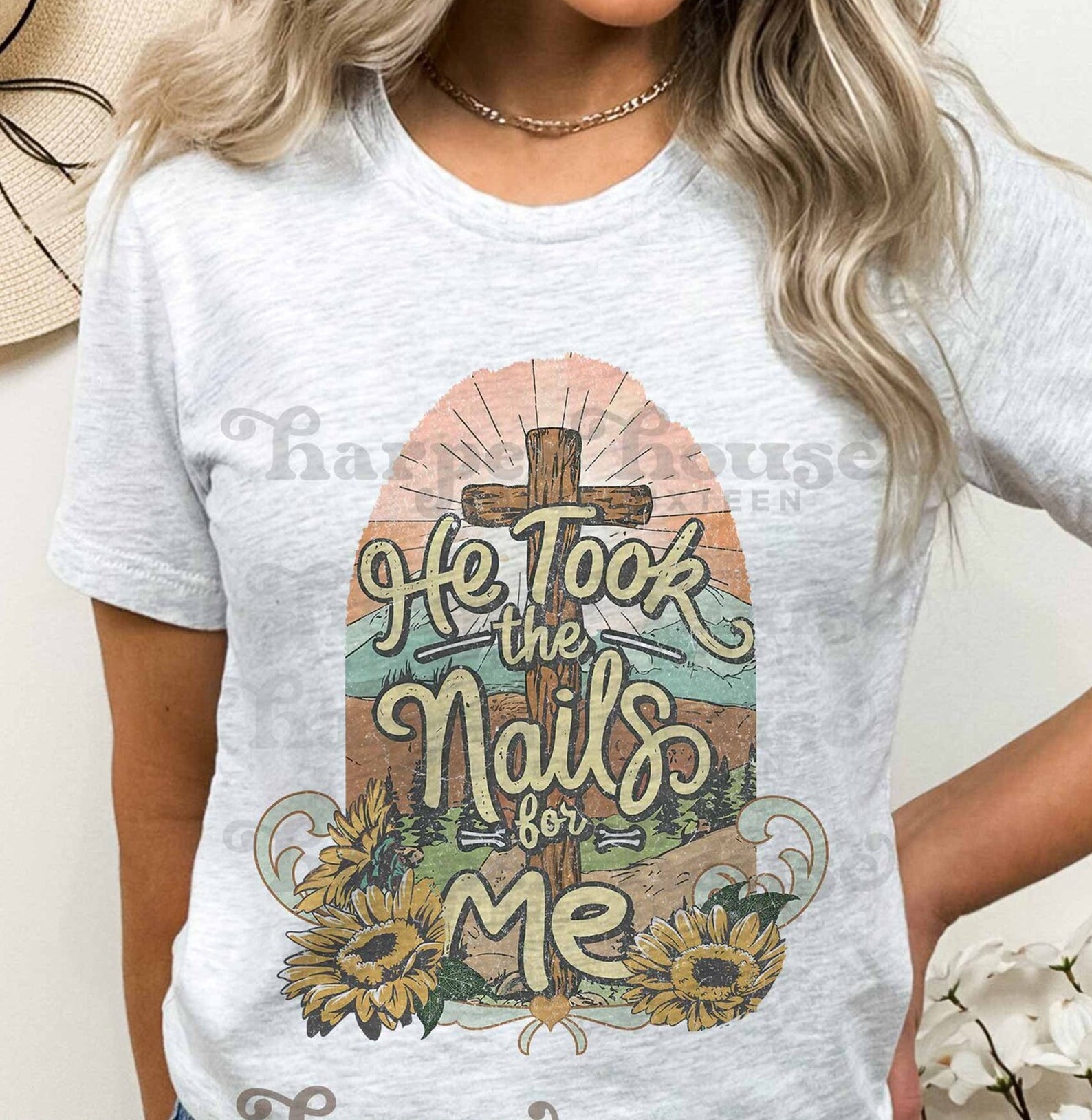 Black graphic tee featuring a design inspired by "Ho Took the Nails for Me" by Anchored Grace Boutique, casual and stylish.