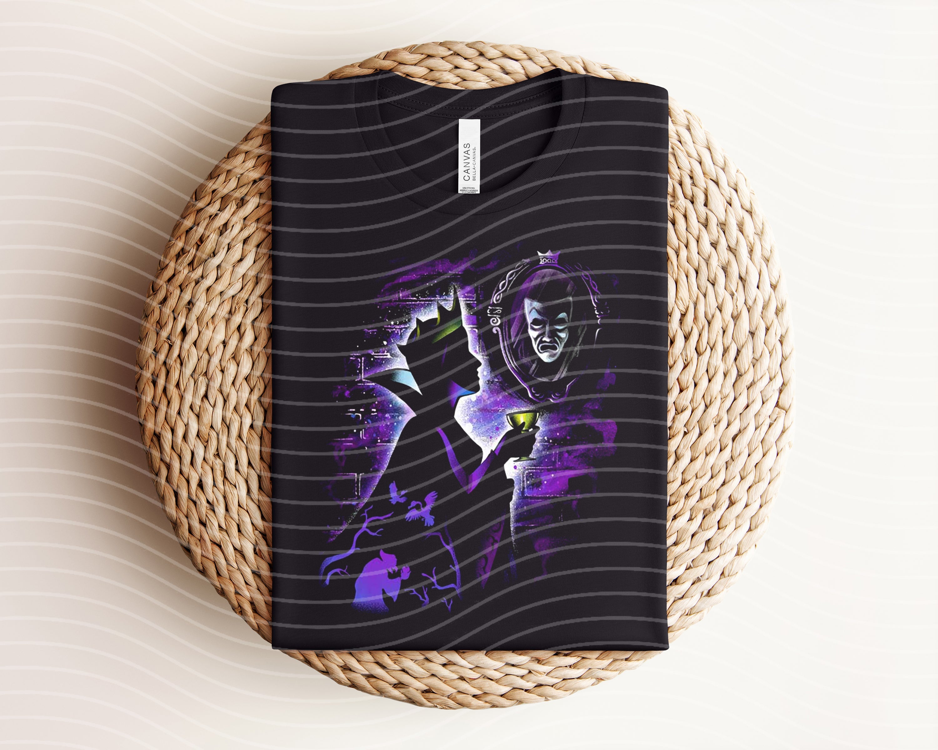 Evil Queen dark graphic tee by Anchored Grace Boutique featuring a bold, black T-shirt with a striking evil queen illustration.