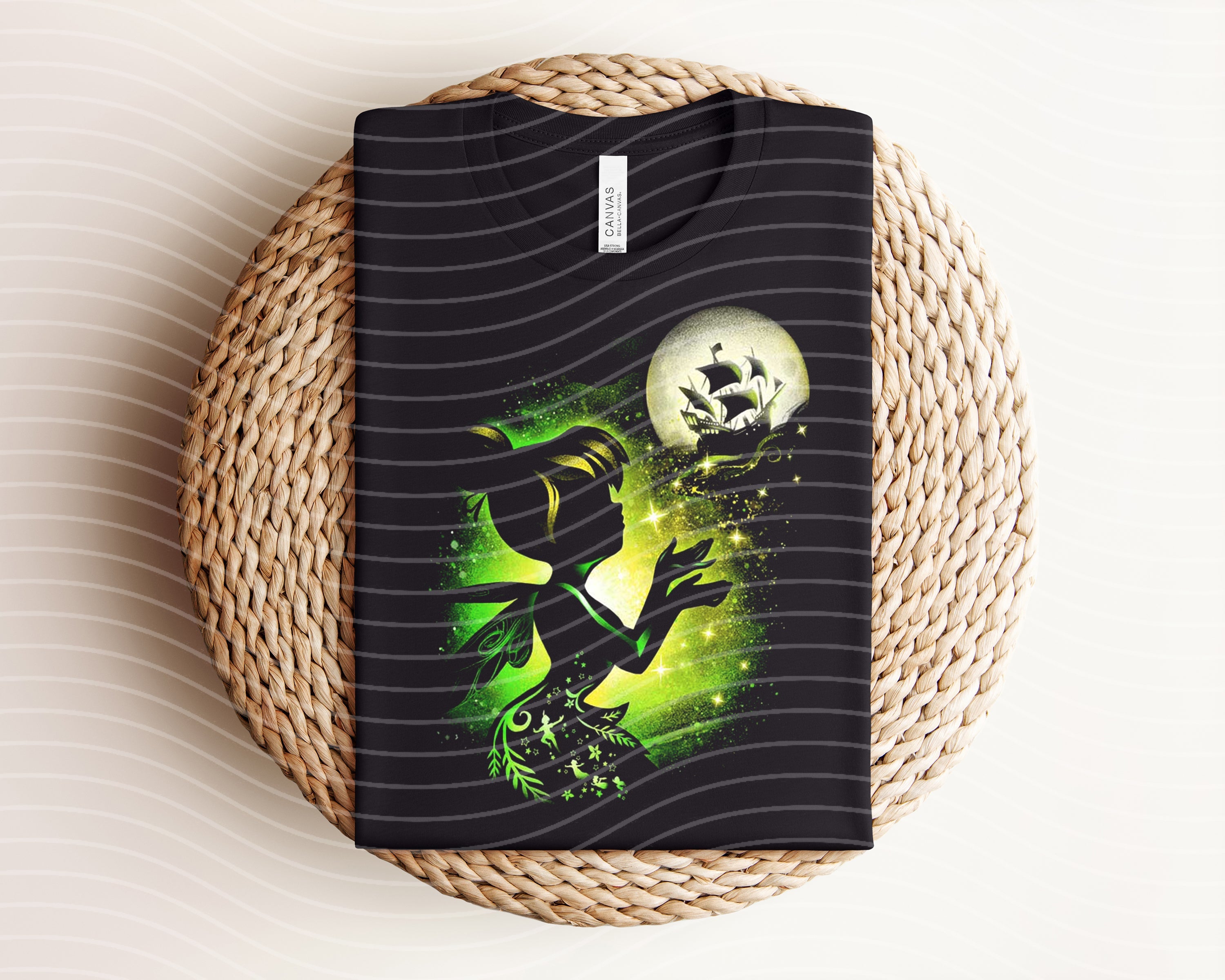 Dark graphic Tink tee by Anchored Grace Boutique featuring a bold, artistic design on soft fabric.