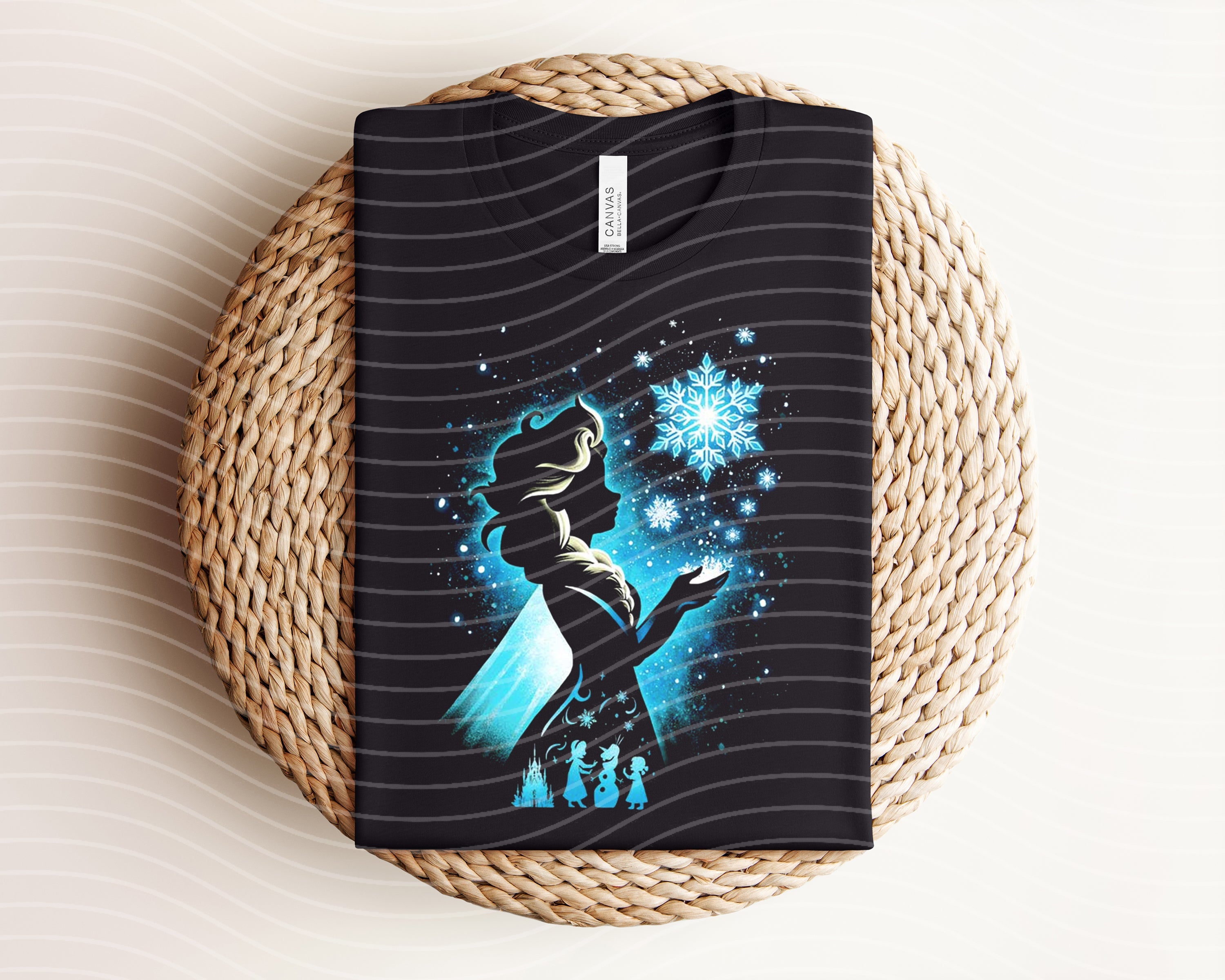 Elsa dark graphic tee from Anchored Grace Boutique featuring a stylish, bold design on a comfortable black t-shirt.