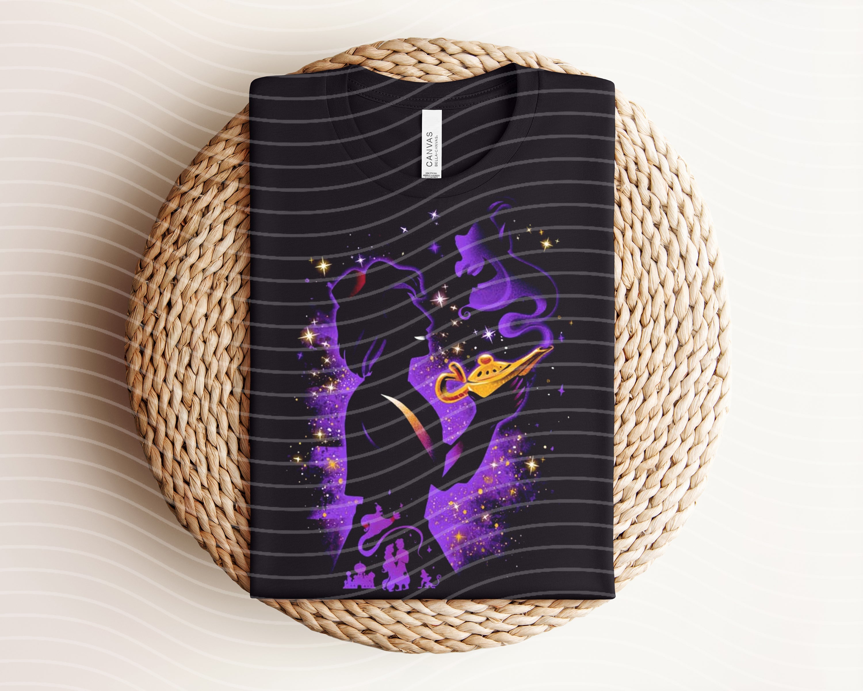 Aladdin dark graphic tee by Anchored Grace Boutique featuring a vibrant, artistic design on a black cotton T-shirt.