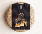 Dark graphic tee featuring Mufasa design by Anchored Grace Boutique, with bold lion illustration and stylish fit.