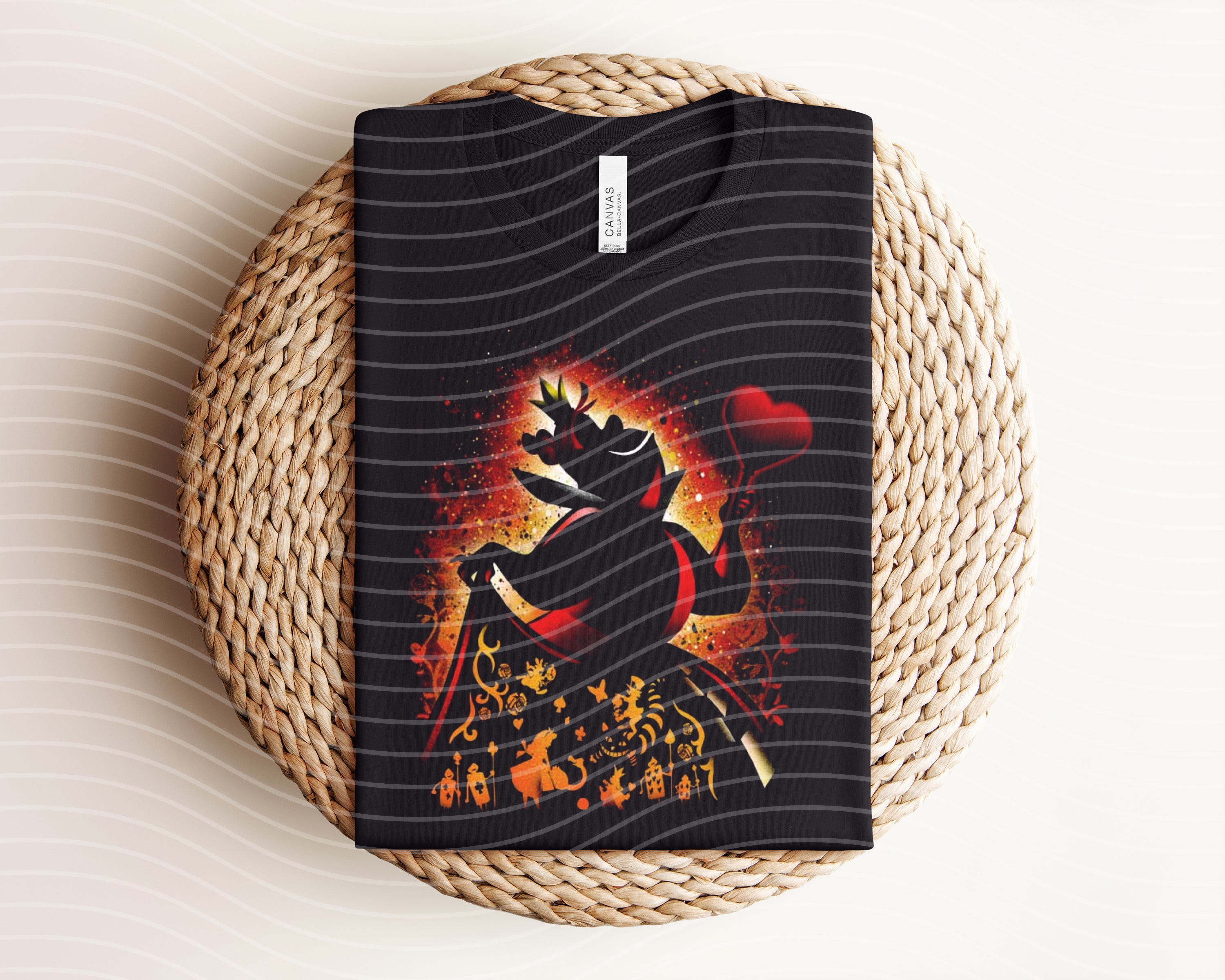 Dark graphic tee featuring Queen of Hearts design from Anchored Grace Boutique, casual style with bold heart and card motifs.