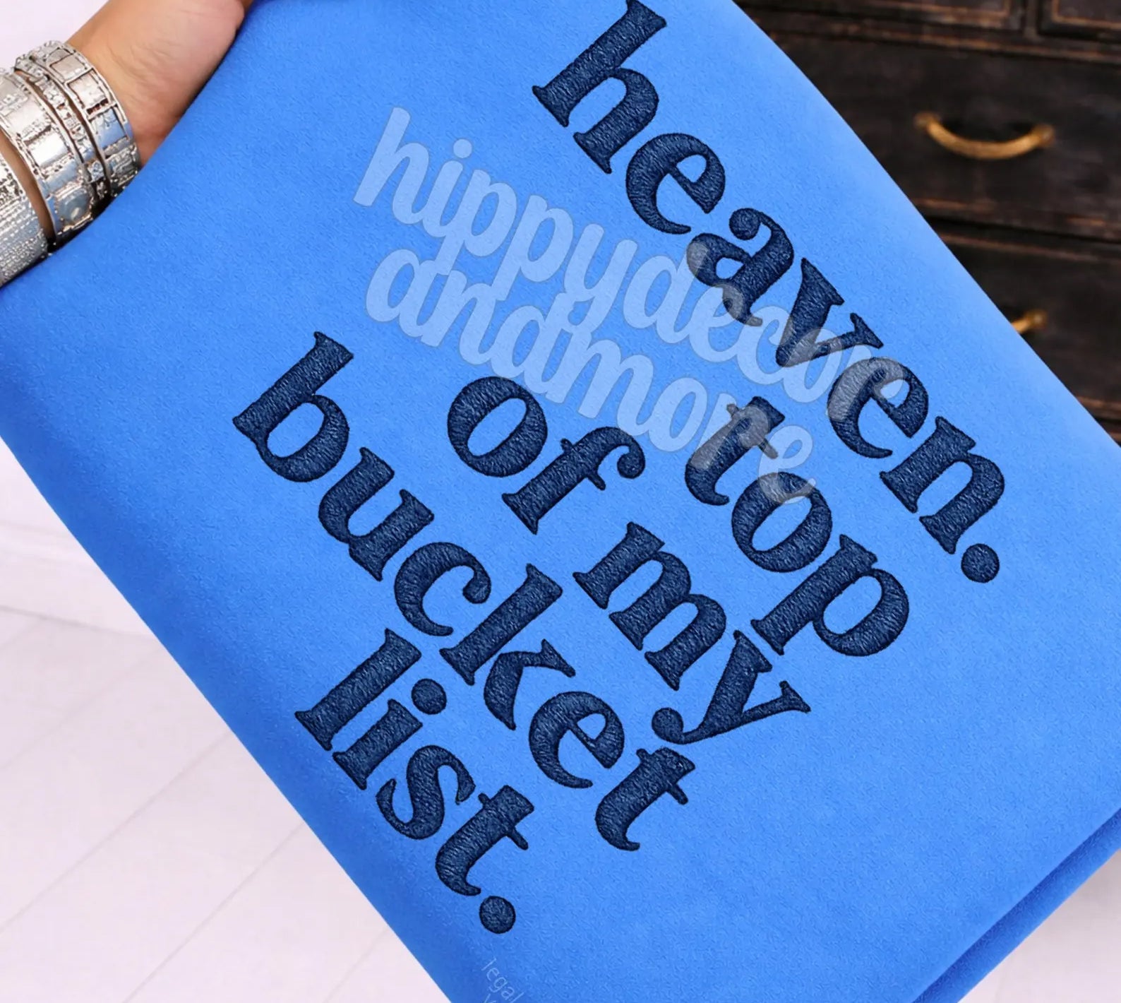 Gray graphic tee from Anchored Grace Boutique featuring "Top of My Bucket List" design, casual fit, and vibrant print.