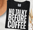 No Talky Before Coffee graphic tee by Anchored Grace Boutique, featuring a stylish design on a casual cotton t-shirt.