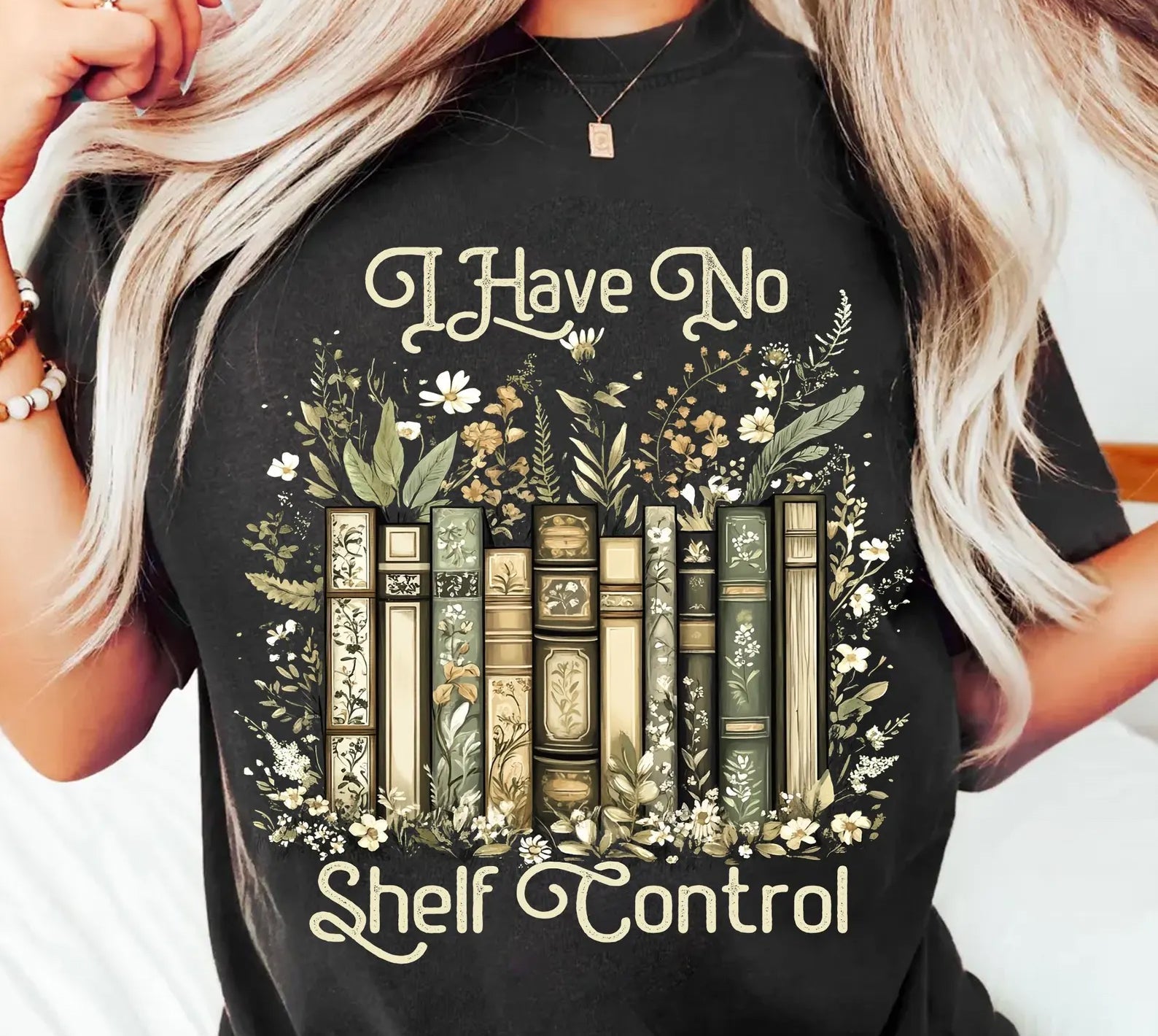 Black graphic tee from Anchored Grace Boutique featuring the humorous "I Have No Shelf Control" design on the front.