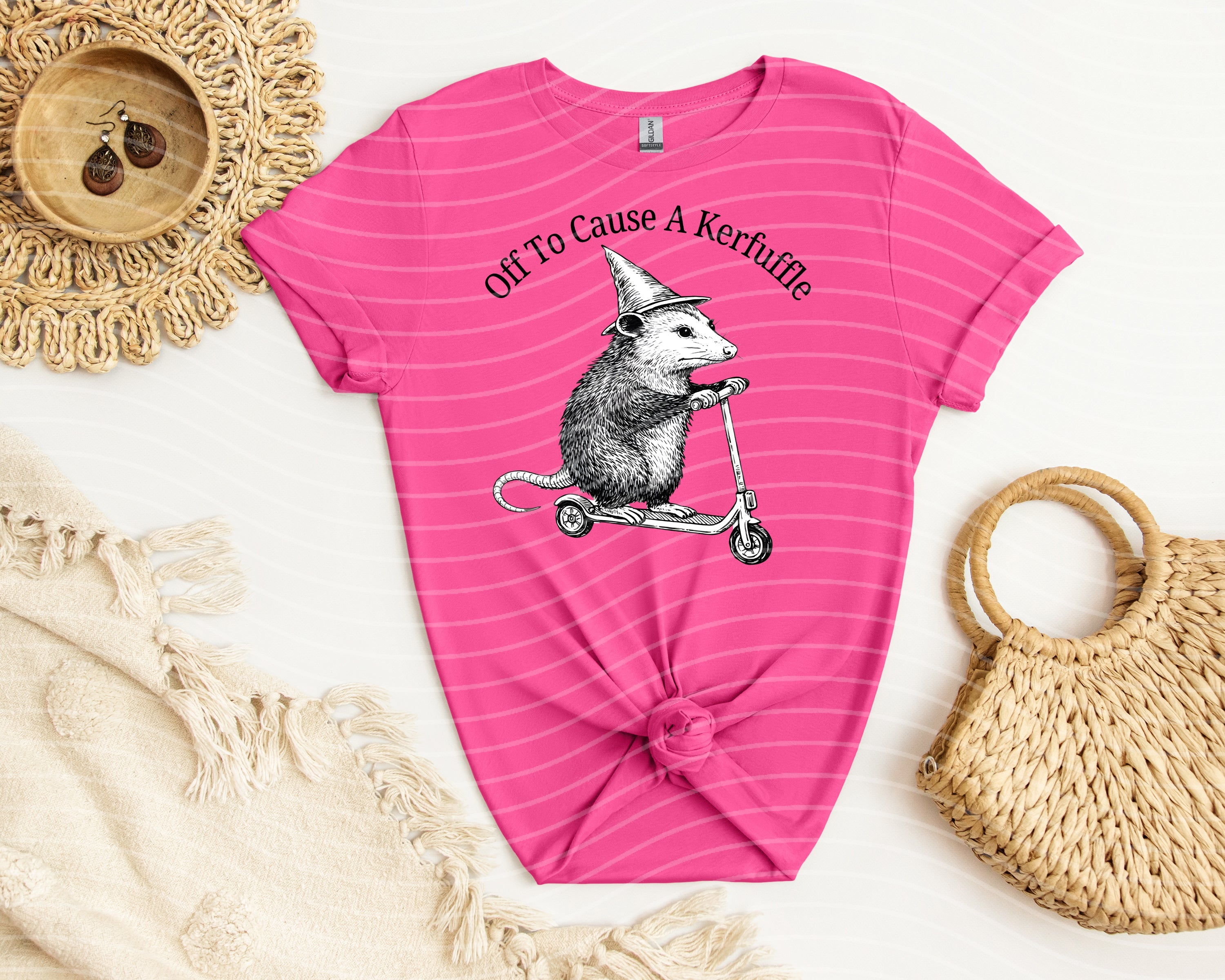 Off to Cause a Kerfuffle graphic tee by Anchored Grace Boutique, featuring a playful design on a casual unisex t-shirt.