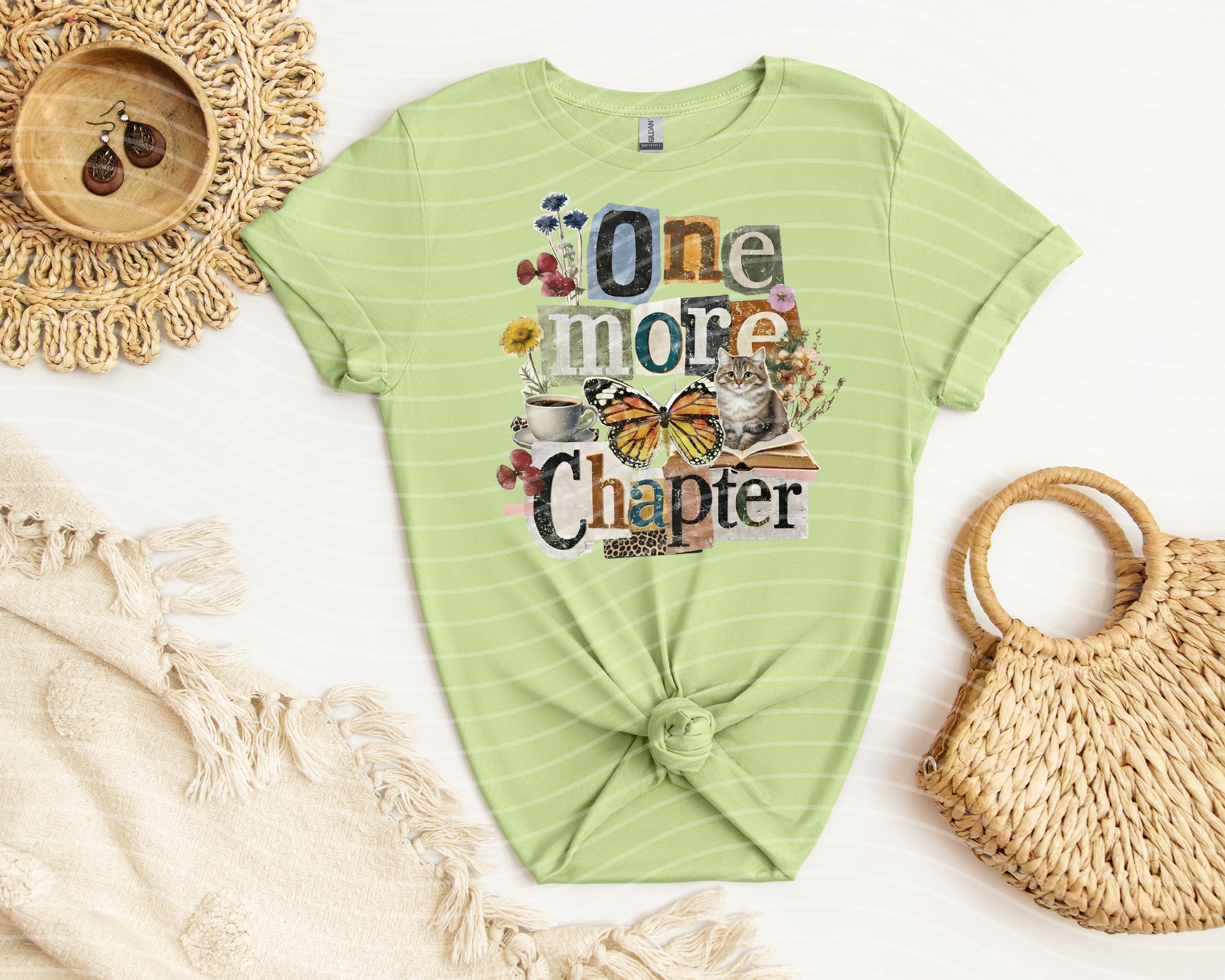 Black One More Chapter graphic tee by Anchored Grace Boutique featuring a stylish book-themed design on soft cotton fabric.