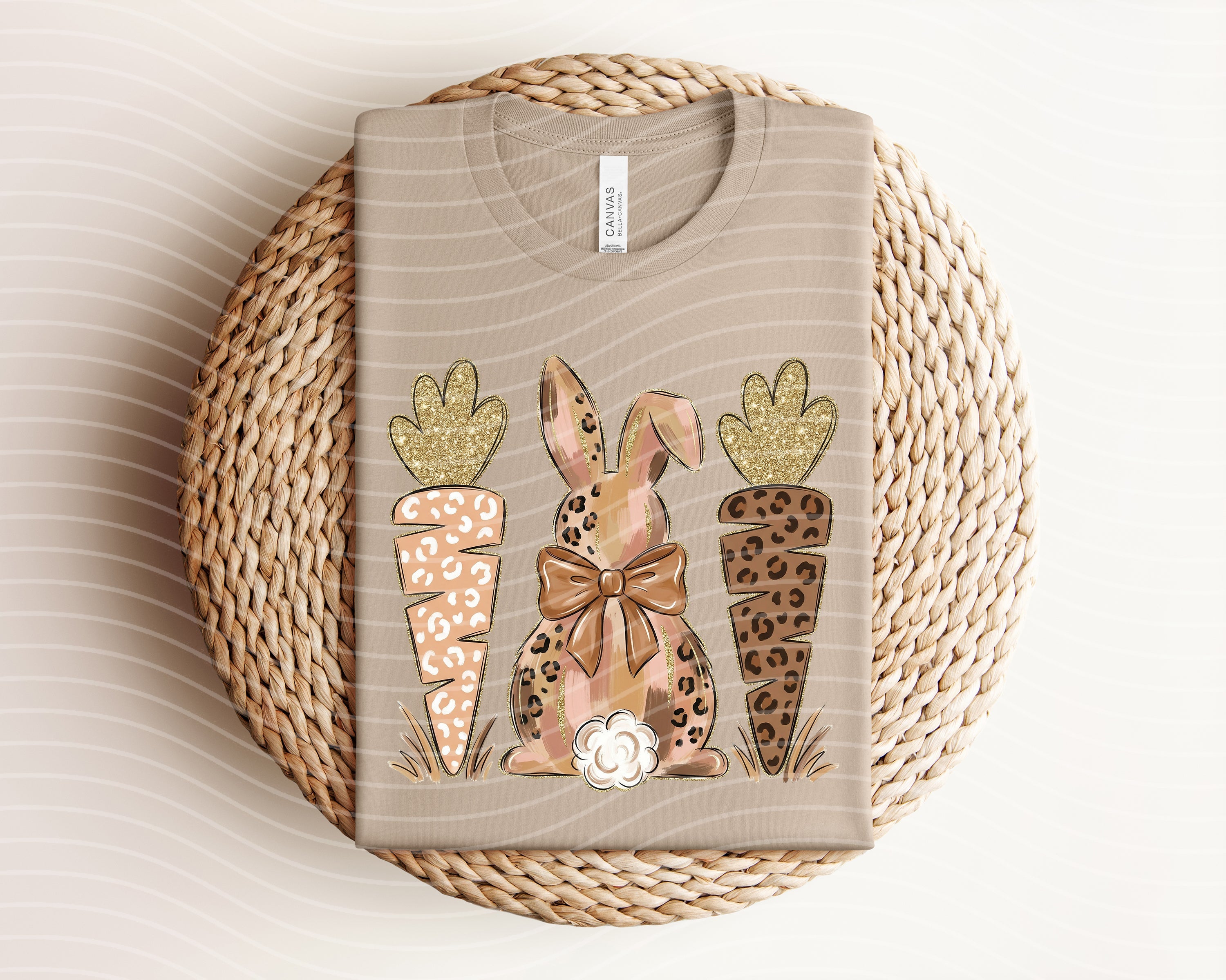 Leopard bunny graphic tee from Anchored Grace Boutique featuring carrots and playful animal illustration on soft fabric.