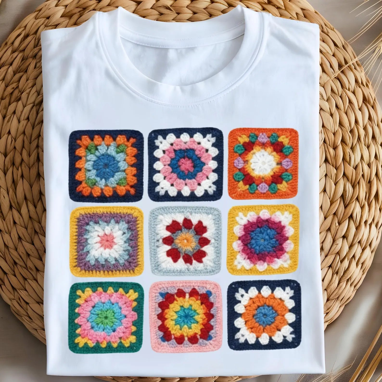 Colorful Granny Squares graphic tee by Anchored Grace Boutique featuring vibrant crochet-inspired patterns on a casual cotton t-shirt.