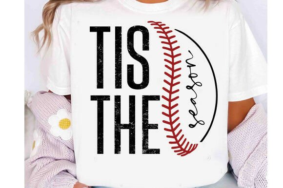 Gray "Tis the Season" graphic tee from Anchored Grace Boutique, featuring festive holiday design and comfortable cotton fabric.