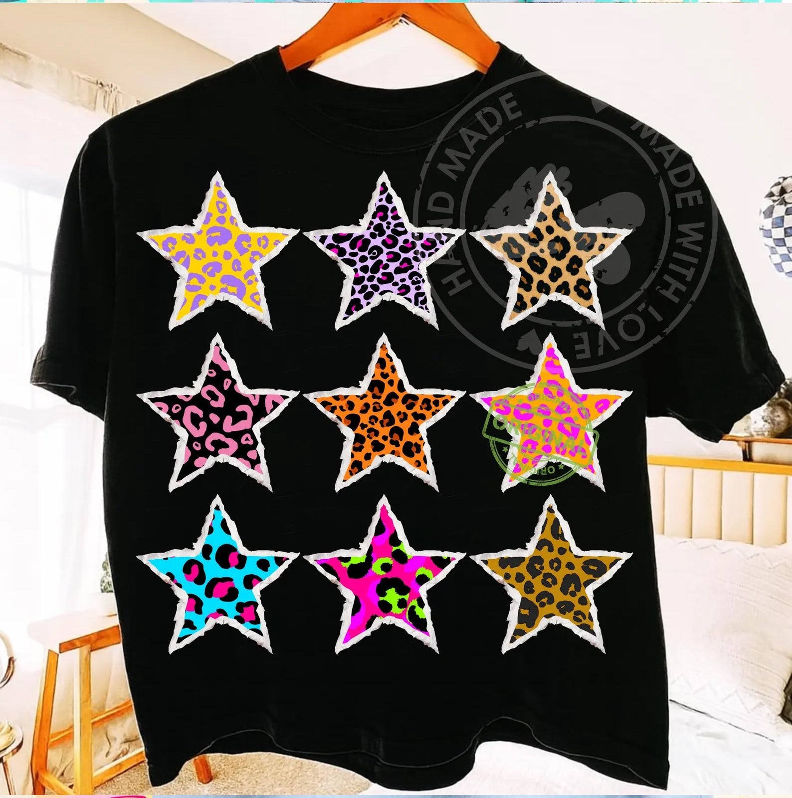 Leopard stars graphic tee by Anchored Grace Boutique featuring a stylish design on soft fabric.