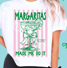 Black graphic tee from Anchored Grace Boutique with "Margaritas Made Me Do It" slogan, casual and stylish for everyday wear.