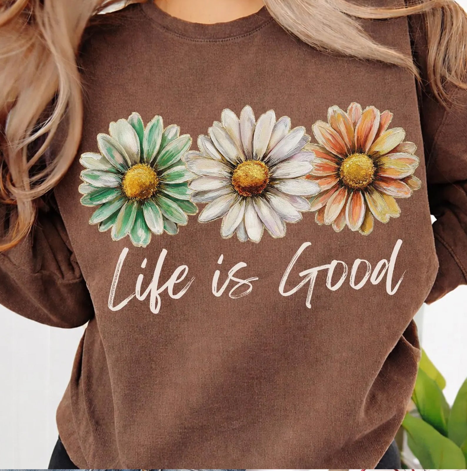 Life is Good graphic tee with colorful printed design, casual short-sleeve shirt from Anchored Grace Boutique.