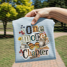 Anchored Grace Boutique One More Chapter graphic tee featuring a stylish design, casual fit, and soft fabric for everyday wear.