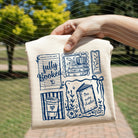 Fully Booked graphic tee by Anchored Grace Boutique featuring a stylish book-themed design on a casual t-shirt.