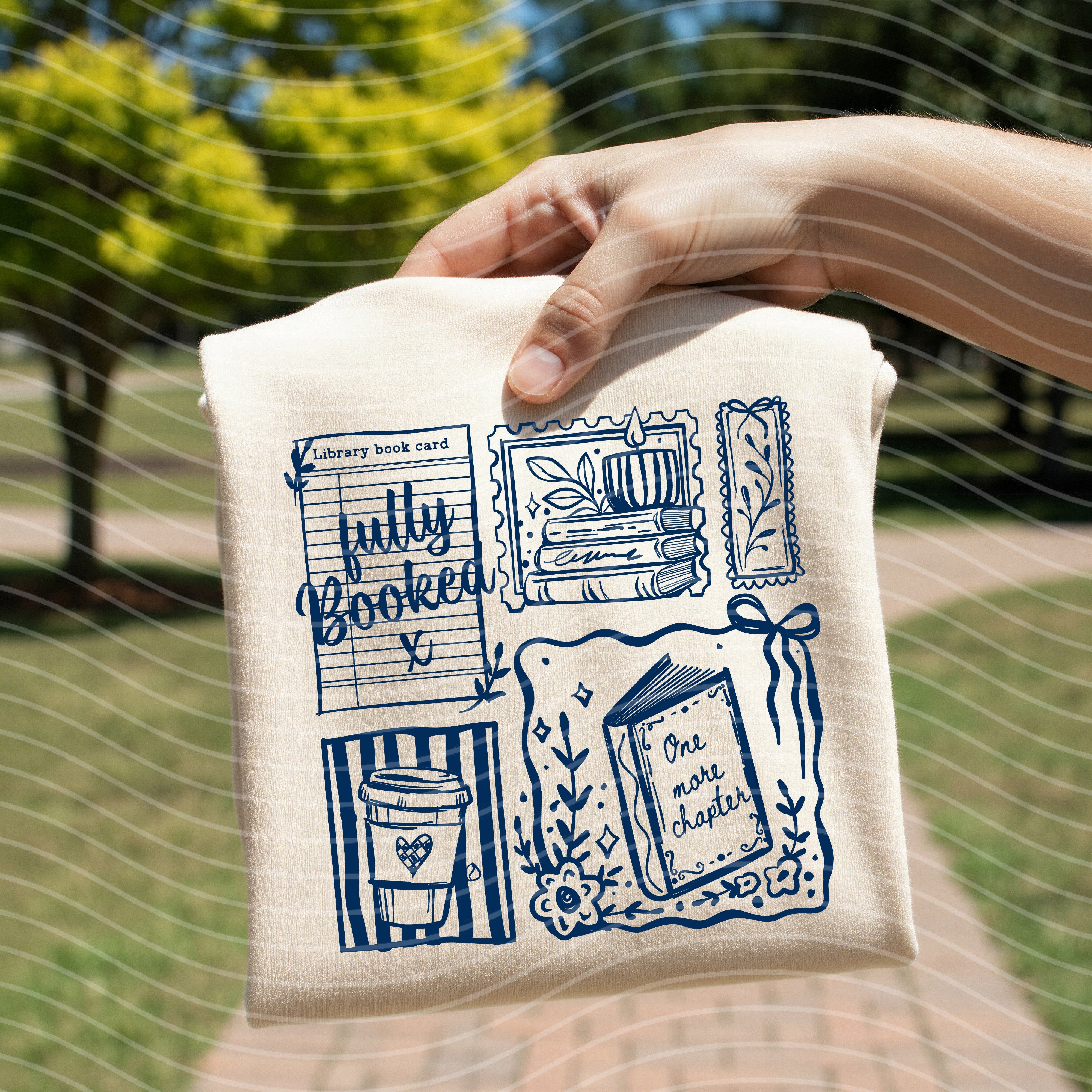 Fully Booked graphic tee by Anchored Grace Boutique featuring a stylish book-themed design on a casual t-shirt.