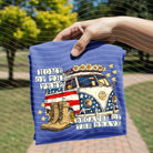 Gray graphic tee from Anchored Grace Boutique featuring "Home of the Free Because of the Brave" slogan and patriotic design.