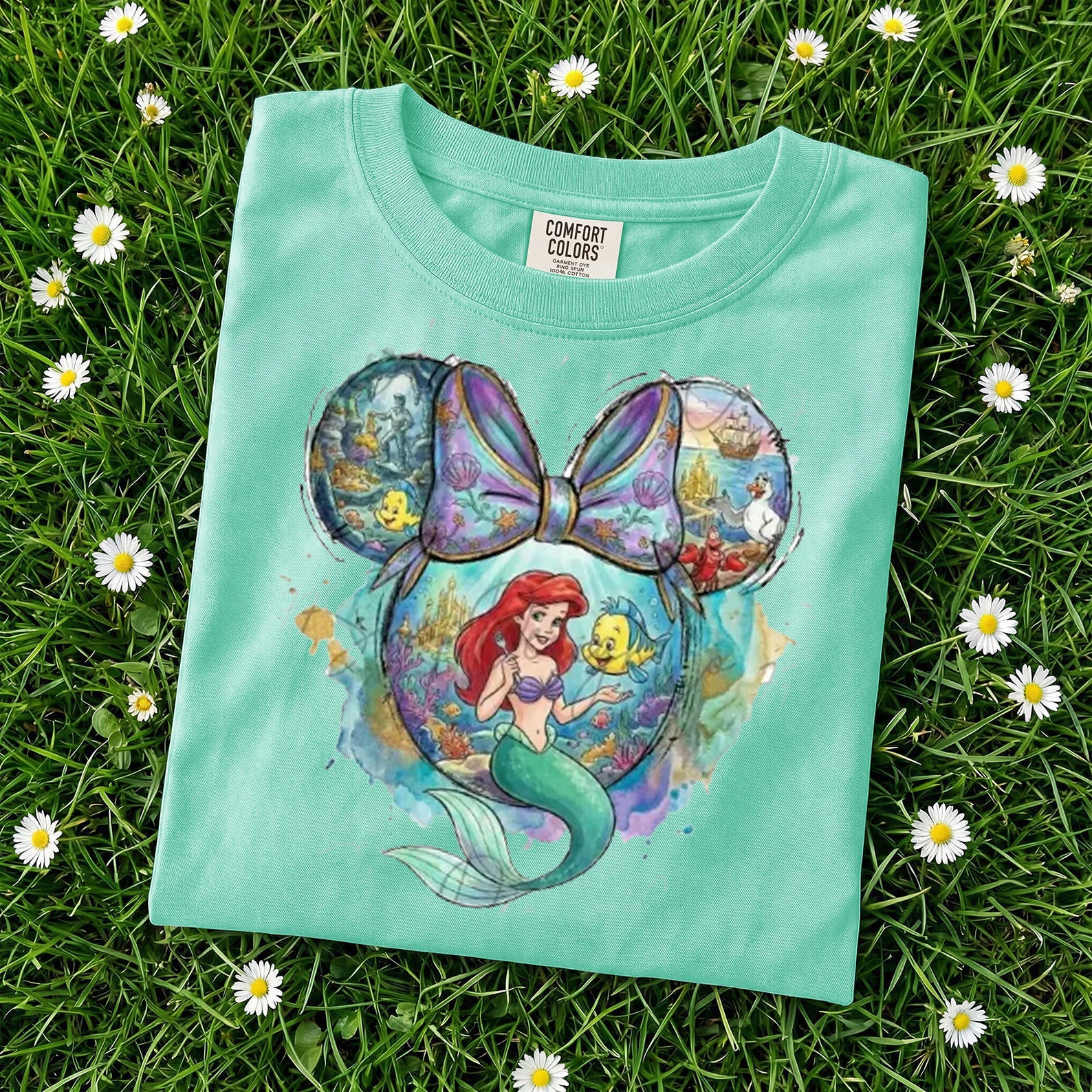 Ariel Friend graphic tee from Anchored Grace Boutique featuring a colorful, playful design on a casual cotton t-shirt.