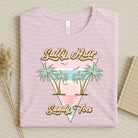 Salty Hair Sandy Toes graphic tee by Anchored Grace Boutique, featuring a beach-inspired design on a casual cotton t-shirt.