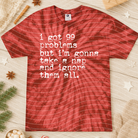 Black graphic tee with "I Got 99 Problems" slogan in white lettering, casual style from Anchored Grace Boutique.