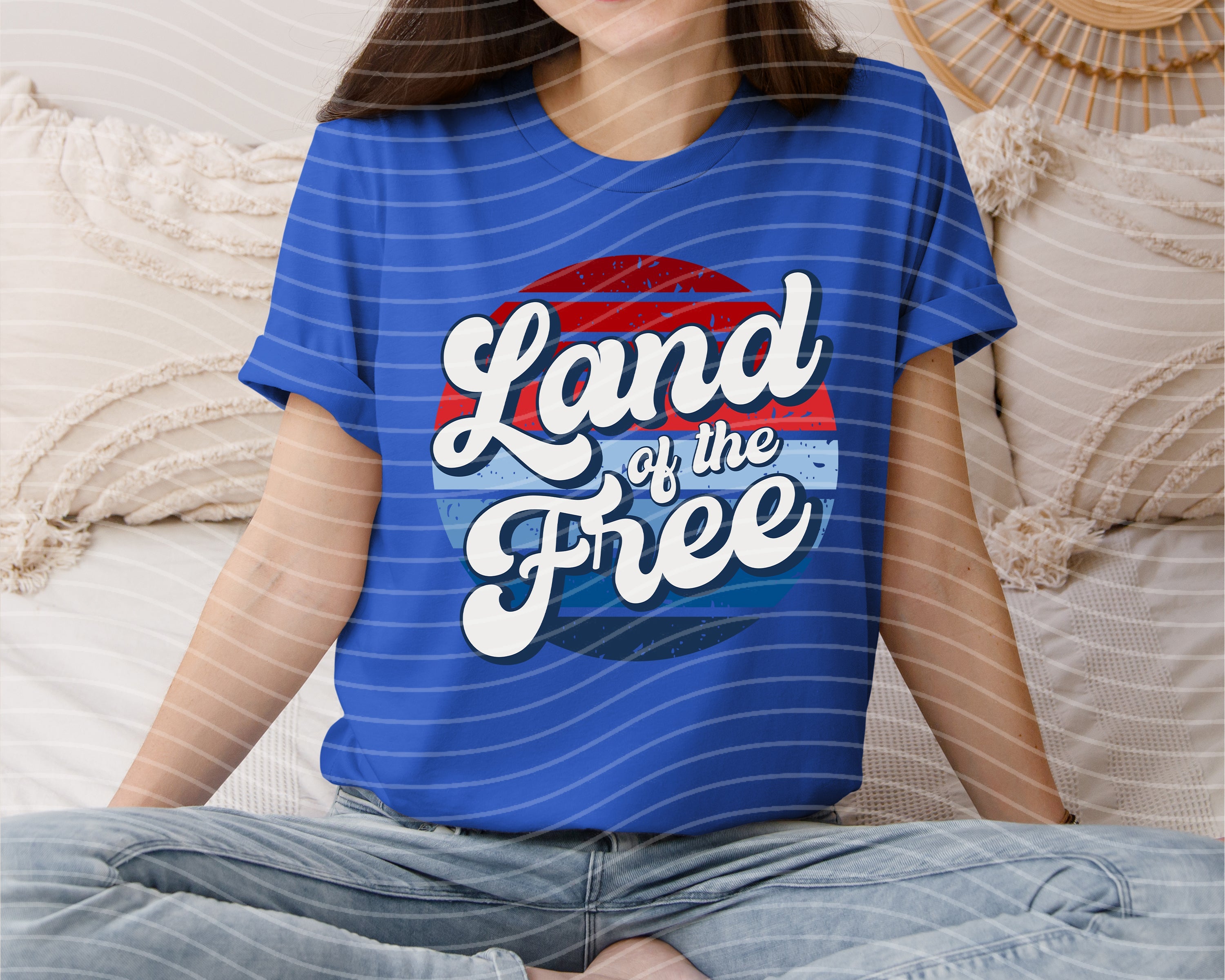 Black Land of the Free graphic tee by Anchored Grace Boutique featuring patriotic design and bold lettering.