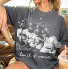 Bunch of Weenies graphic tee from Anchored Grace Boutique featuring playful cartoon weenies on a casual black t-shirt.