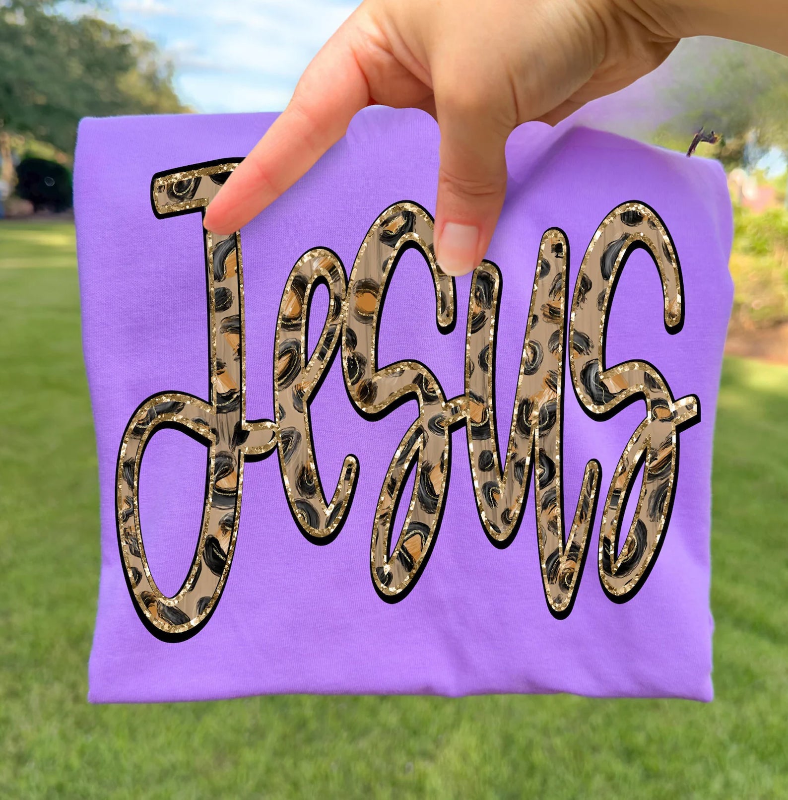 Jesus Leopard graphic tee from Anchored Grace Boutique, featuring a stylish leopard design on a casual cotton t-shirt.
