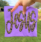 Jesus Leopard graphic tee from Anchored Grace Boutique, featuring a stylish leopard design on a casual cotton t-shirt.