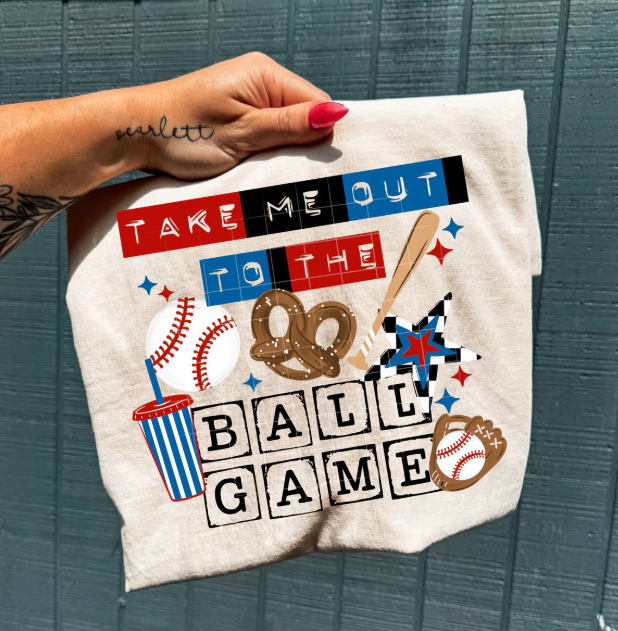 Anchored Grace Boutique Take Me Out to the Ball Game graphic tee, casual shirt with baseball-themed design and fun lettering.