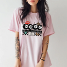 Black graphic tee by Anchored Grace Boutique featuring bold "Nope Absolutely Not" text on the front.