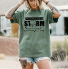 Anchored Grace Boutique graphic tee featuring a storm illustration and calming message, casual and comfortable men's or women's T-shirt
