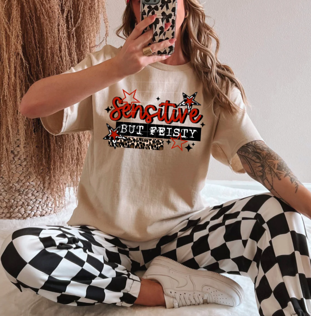 Sensitive But Feisty graphic tee by Anchored Grace Boutique, white cotton t-shirt with bold black text design.