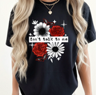 Black graphic tee by Anchored Grace Boutique with bold "Don't Talk to Me" print, casual and stylish for everyday wear.