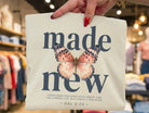 Made New graphic tee by Anchored Grace Boutique featuring a stylish design on a comfortable cotton t-shirt.