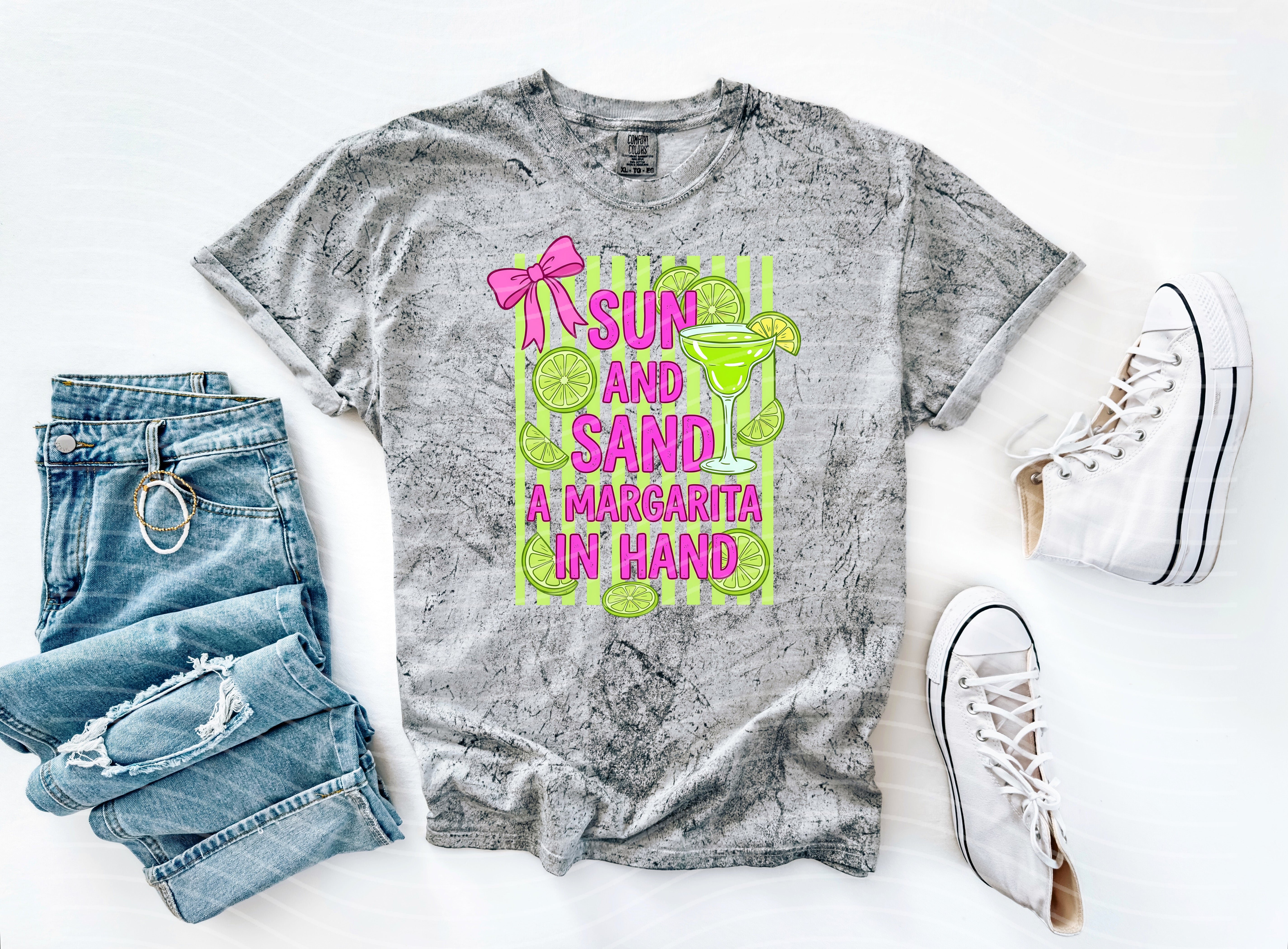 Sun and Sand Margarita in Hand graphic tee from Anchored Grace Boutique, featuring a colorful tropical design on a casual cotton shirt.